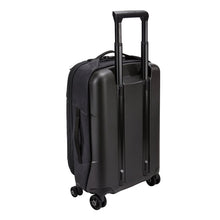 Load image into Gallery viewer, Angled back panel view of the black suitcase with the telescopic handle partly extended.