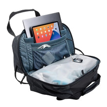 Load image into Gallery viewer, Interior view of the black duffle bag filled with electronics and accessories in the organization pockets.