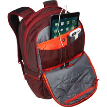 Load image into Gallery viewer, Interior view of the front panel's pocket with a laptop and phone in the compartments.