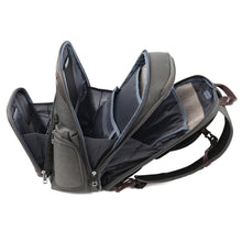 Load image into Gallery viewer, Side panel view of the gray backpack with all the compartments unlocked.