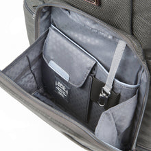 Load image into Gallery viewer, Close up to the interior front panel of the suitcase. It features an RFID organizational pocket, and a key sling.