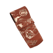 Load image into Gallery viewer, Front view of the Crimson Hare pen case. It is red with patterns of white flowers, waves, and hares.