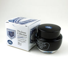 Load image into Gallery viewer, The dark washed ink bottle with its box on a white background. it is a dark navy blue.