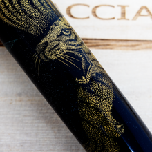 Load image into Gallery viewer, Close up to the tiger etching on the pen's barrel.