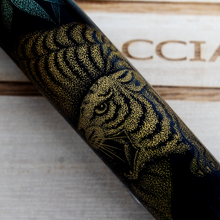 Load image into Gallery viewer, Close up to the etched tiger design on the barrel.