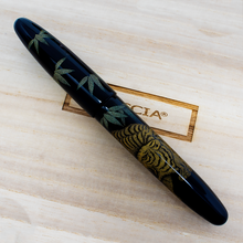 Load image into Gallery viewer, Front view of the fountain pen with the cap on. Placed on top of the wooden presentation box.