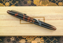 Load image into Gallery viewer, Side view of the fountain pen with the cap on.