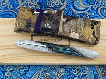 Load image into Gallery viewer, Front view of the fountain pen arranged with the Kimono sleeve and wooden presentation box.