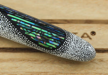 Load image into Gallery viewer, Close up to the blue abalone and quail egg shells on the barrel.