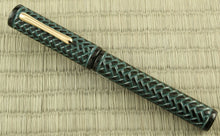 Load image into Gallery viewer, Front view of the fountain pen with the cap on.