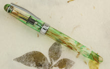 Load image into Gallery viewer, Side view of the fountain pen with the cap on.