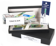 Load image into Gallery viewer, Taccia Spotlight Forest Eye Demonstrator Fountain Pen, Presentation Box, Cardboard Box, Ink Refills, Ink Converter, and Documents