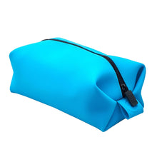 Load image into Gallery viewer, Angled view of the blue toiletry bag.