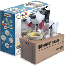 Load image into Gallery viewer, Angled view of the puppy coin bank with the packaging set behind it.