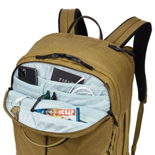 Load image into Gallery viewer, Interior view of the front pocket, featuring its organizational pockets filled with travel accessories. (Items not included)
