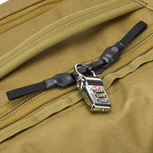 Load image into Gallery viewer, Close up to the backpack's zippers locked with a TSA approved three-digit combination lock.