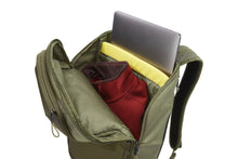 Load image into Gallery viewer, Interior view of the backpack with a jacket, a folder, and a laptop tucked inside separate compartments.