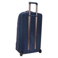 Load image into Gallery viewer, Angled back panel view of the dress blue duffle bag.