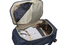 Load image into Gallery viewer, Angled interior view of the dress blue duffle with clothes arranged inside.
