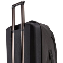 Load image into Gallery viewer, Angled back panel view of the suitcase's top half. The telescopic handle is partly extended.