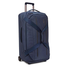 Load image into Gallery viewer, Angled front panel view of the dress blue duffle.