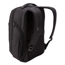 Load image into Gallery viewer, Angled back panel view of the black backpack with the adjustable straps extended.