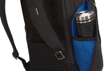 Load image into Gallery viewer, Close up to the side panel's unzipped pocket with a water bottle tucked inside.