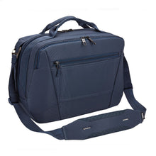 Load image into Gallery viewer, Angled front panel view of the navy blue duffle bag.