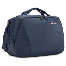 Load image into Gallery viewer, Angled front panel view of the navy blue bag.