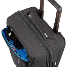 Load image into Gallery viewer, Angled top view showing a pair of sunglasses  in the front pocket.