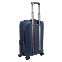 Load image into Gallery viewer, Angled back panel view of the suitcase with the telescopic handle extended.