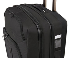 Load image into Gallery viewer, Angled close up to the top of the suitcase. It features a grab handle.