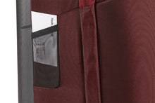 Load image into Gallery viewer, Close up to the side panel showing a small pocket with a business card tucked inside.
