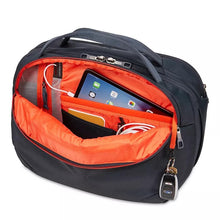 Load image into Gallery viewer, Angled front panel view of the black bag with a tablet, cables, a small notebook and a pen tucked inside.