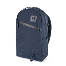Load image into Gallery viewer, Angled front panel view of the navy blue backpack on a white background.