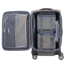 Load image into Gallery viewer, Interior view of the suitcase with two packing cubes shown in the main compartment.