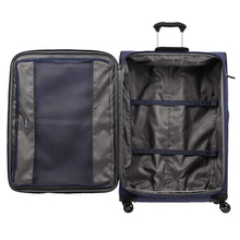 Load image into Gallery viewer, Interior view of the blue suitcase. The front panel features a zipper-closing pocket, and the main compartment an set of straps to hold your contents in place.