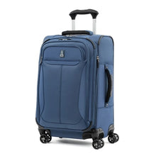 Load image into Gallery viewer, Angled front panel view of the blue suitcase with the telescopic handle partly extended.