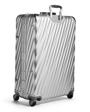 Load image into Gallery viewer, Angled back panel view of the suitcase with the telescopic handle partly extended.