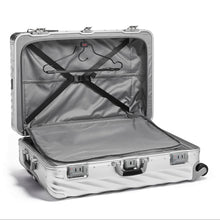 Load image into Gallery viewer, Interior view of the suitcase with the front panel's divider unzipped. It features a set of adjustable straps to hold your contents in place, and a hanger for garments, which is sold separately.