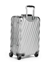 Load image into Gallery viewer, Angled back panel view of the suitcase on a white background.