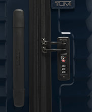 Load image into Gallery viewer, Close up to the side panel's grab handle, tag, and TSA approved three-digit combo lock.