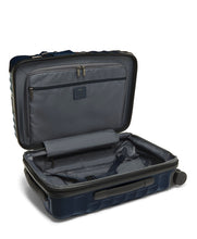 Load image into Gallery viewer, Interior view of the suitcase. The front panel has a zipper-closing divider with a pocket, and the back panel has a set of adjustable straps to hold your contents.