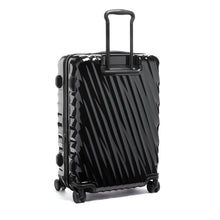 Load image into Gallery viewer, Angled back panel view of the suitcase with the telescopic handle partly extended.