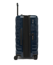Load image into Gallery viewer, Side panel view with the expandable feature unzipped. It shows a tag, a grab handle, and a TSA approved three-digit combination lock.