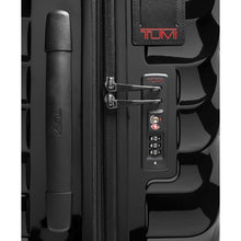 Load image into Gallery viewer, Close up to the side panel. It features a grab handle, a luggage tag, and a TSA approved three-digit combination lock.