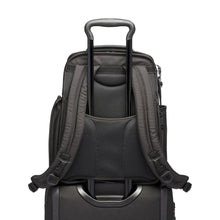 Load image into Gallery viewer, The telescopic handle of a suitcase passes through the attachment strap on the backpack's back panel to hold it in place.