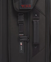 Load image into Gallery viewer, Close up to the side panel of the garment bag. It features a grab handle, a tag, and a TSA approved three-digit combination lock.
