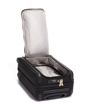 Load image into Gallery viewer, Interior view of the suitcase showinng the back panel unzipped and lifted.