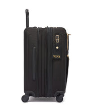 Load image into Gallery viewer, Side panel view of the suitcase with the expandable feature unzipped. It features a grab handle and a luggage tag.